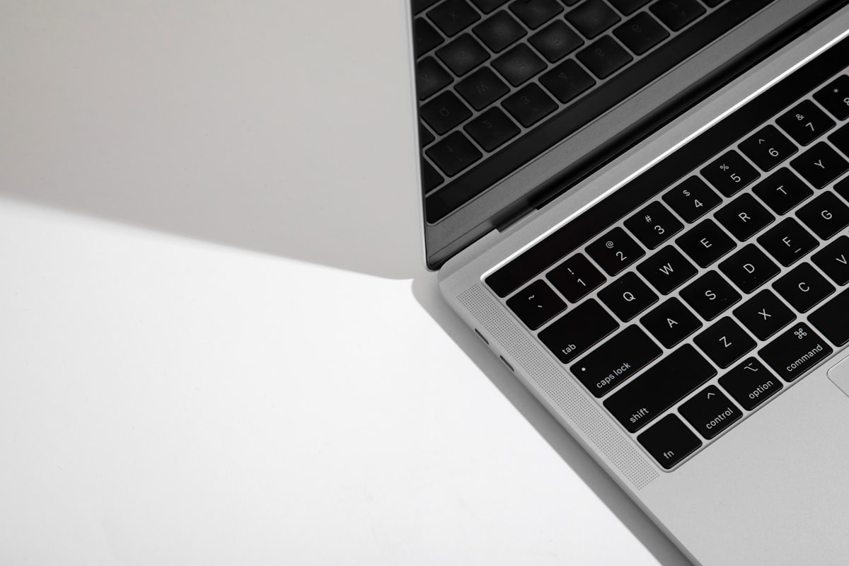 Close-up of a business laptop keyboard and trackpad